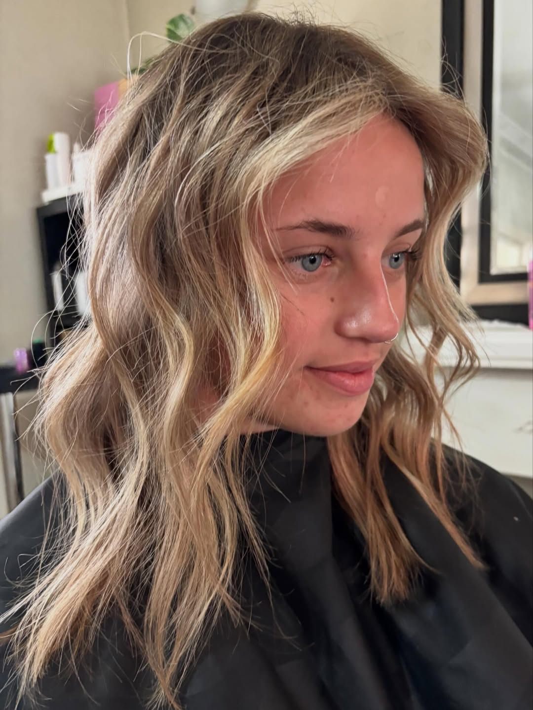 Sun-kissed blonde with face-framing highlights