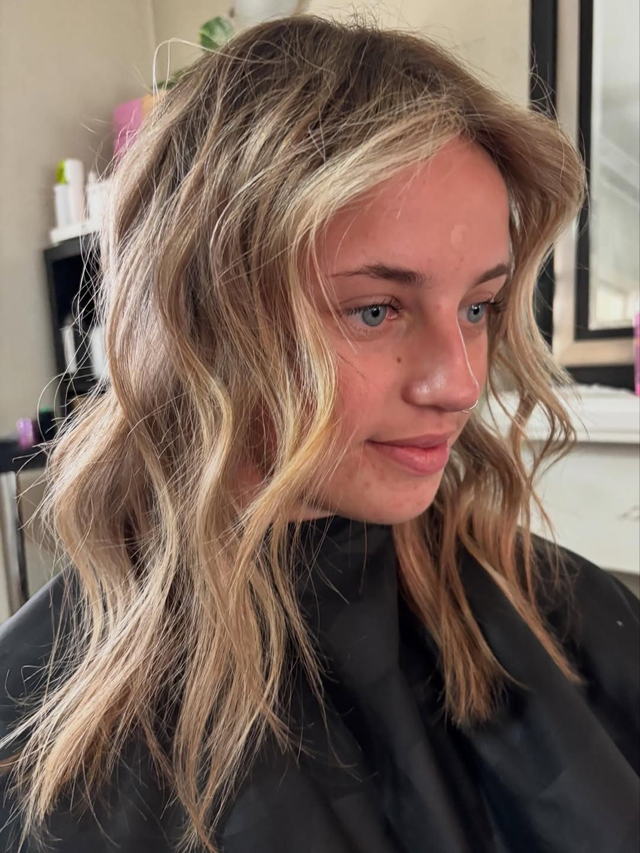 Sun-kissed blonde with face-framing highlights
