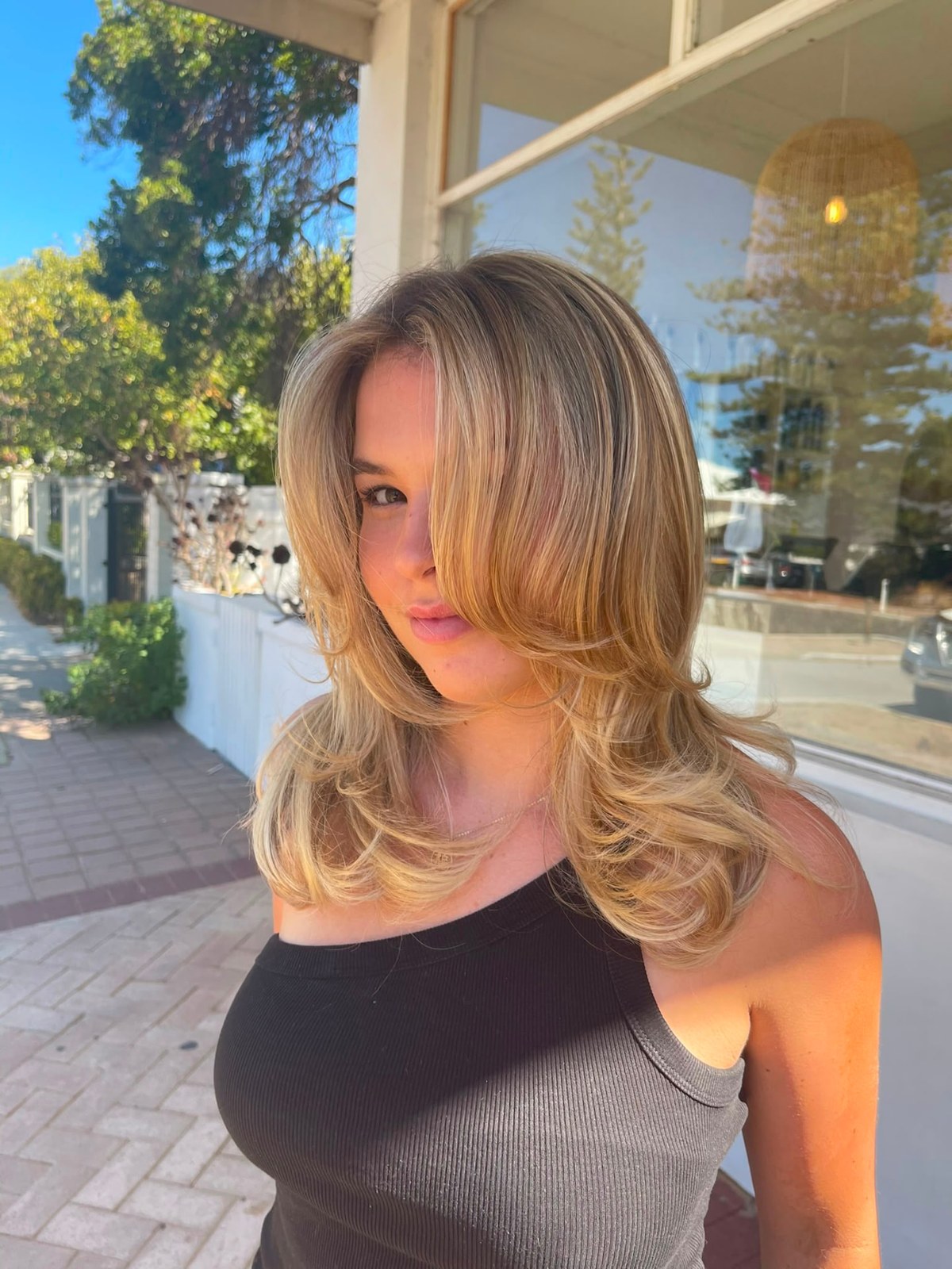 Buttery blonde blow wave with soft face-framing layers