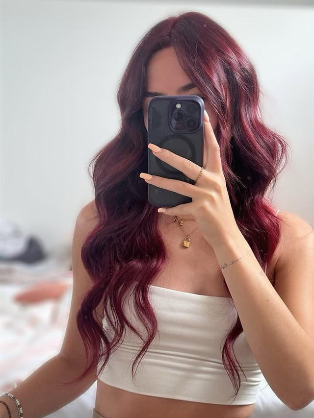 Deep cherry red colour with long glossy waves
