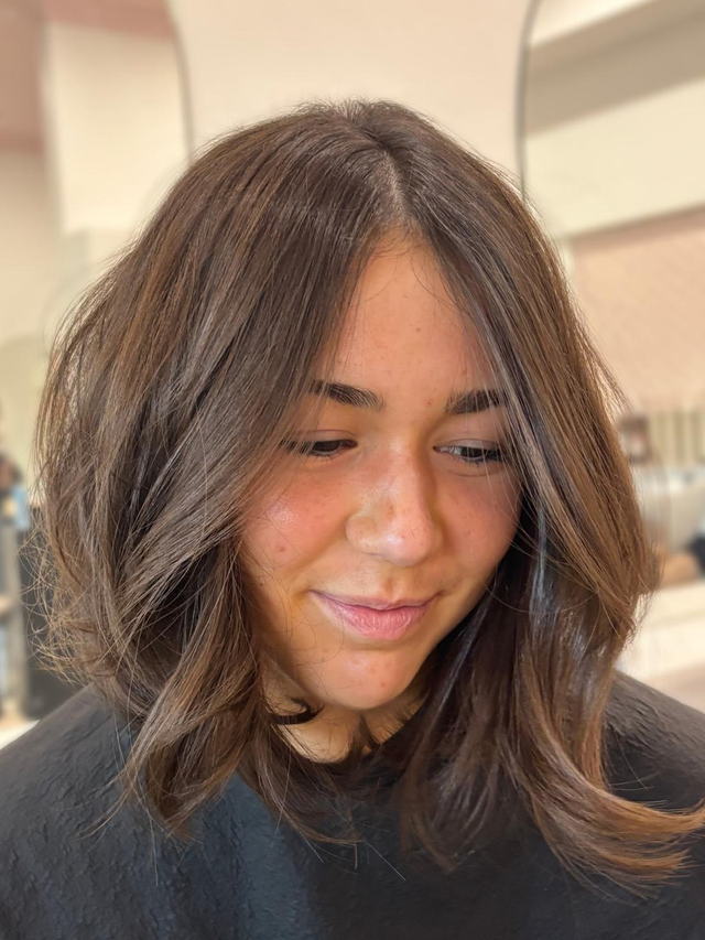 Textured brunette lob with a soft blow wave