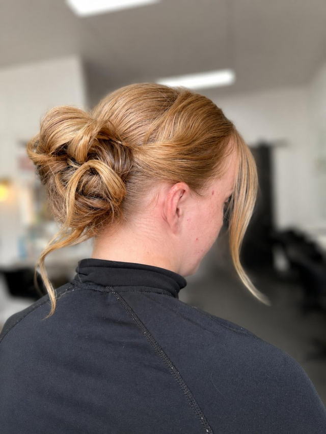 Strawberry blonde textured updo
